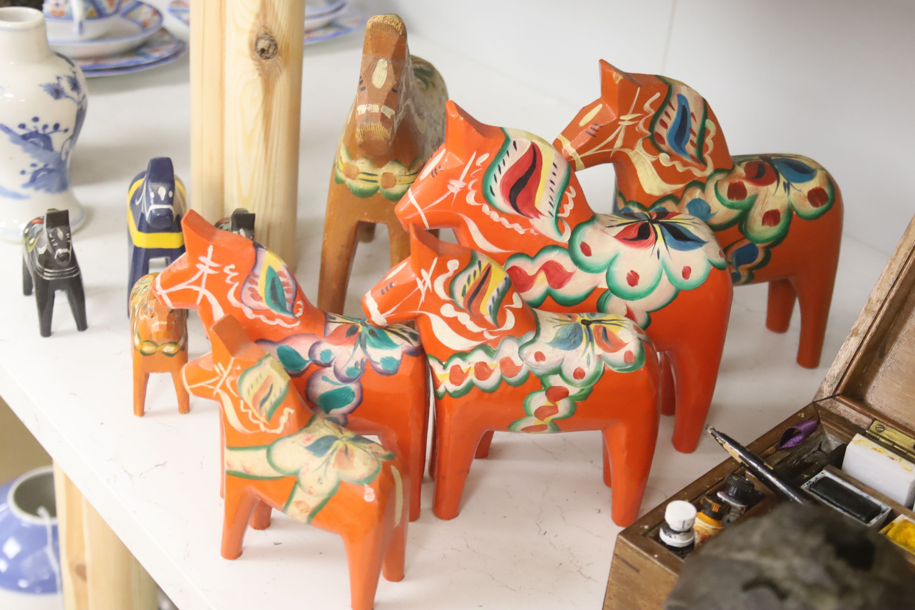 Ten Swedish painted wood Folk Art horses, some by Akta